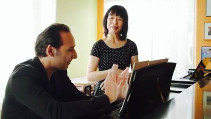 Film capture. Oscar winner 2015, Alexandre Desplat  preparing for recording with Gloria Cheng